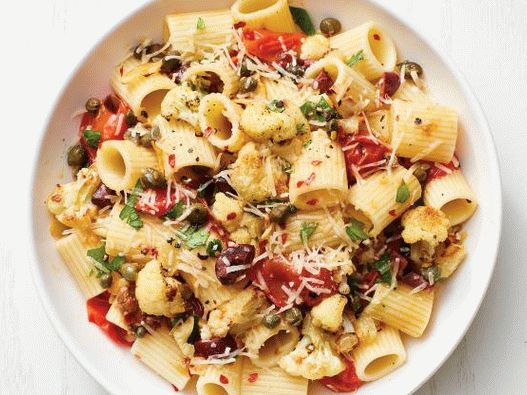 Photo of rigatoni pasta with cauliflower and Putanesca sauce