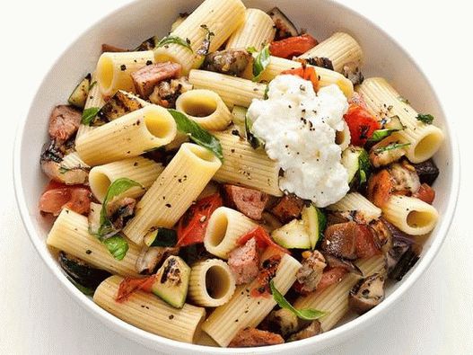 Photo of rigatoni pasta with smoked sausages and eggplant