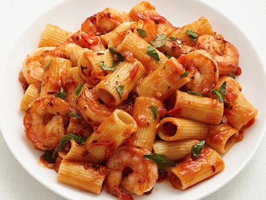 Photo of shrimp rigatoni pasta with tomato sauce