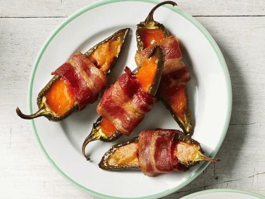 Photo of chili peppers wrapped in bacon