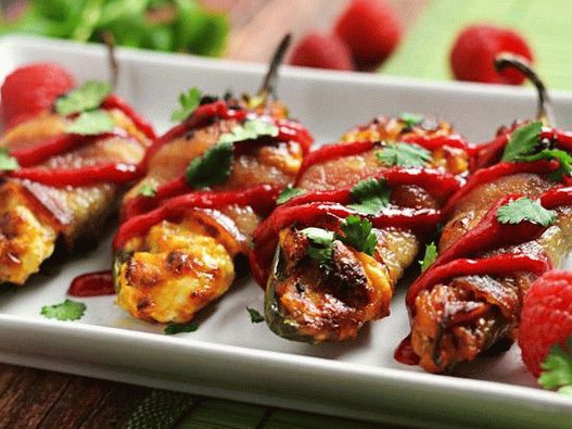Photo of chili pepper wrapped in cheese wrapped in bacon