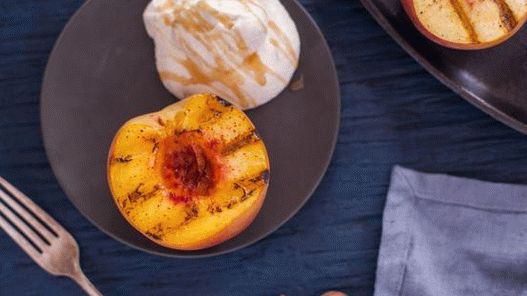 Grilled peaches with honey-orange butter cream and toasted almonds