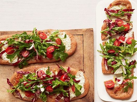 Photo Pizza with tricolor salad