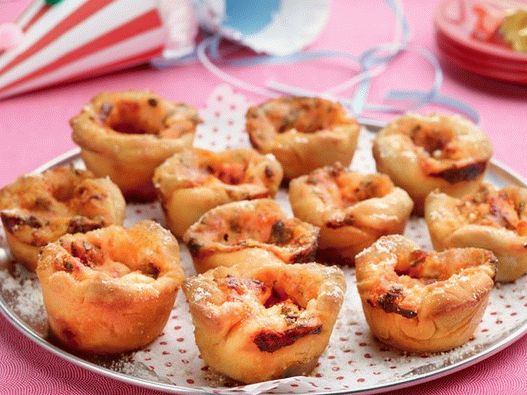 Photo of pizza with chicken in the form of muffins