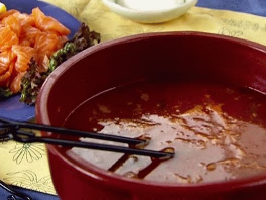 Photo Spicy tomato sabu shabu with seafood