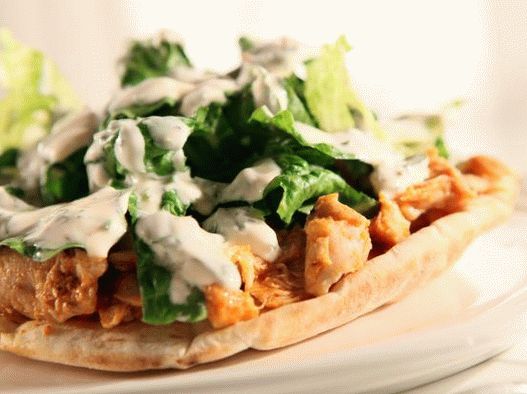 Photo of Pete with chicken stuffing and yogurt sauce