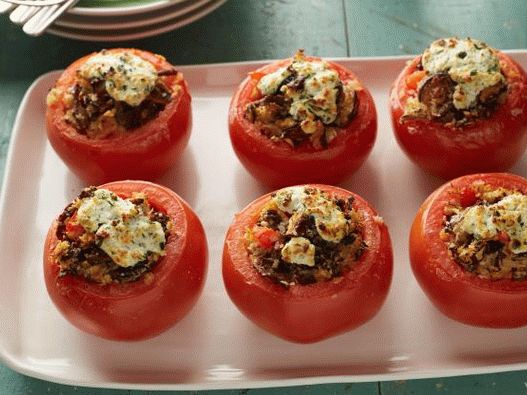 Photo Tomatoes stuffed with mushrooms and cheese