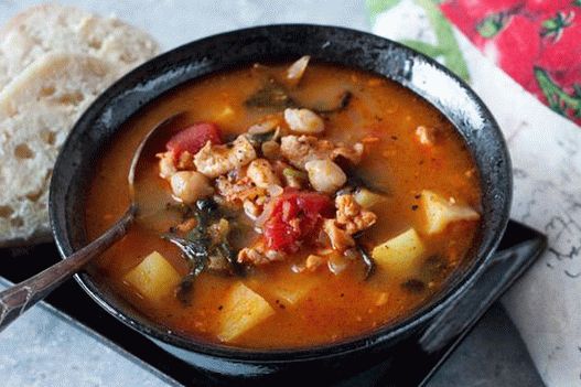 Photo of Portuguese soup with chickpeas and kale cabbage