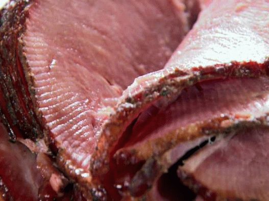 Photo Festive ham in honey glaze on the grill