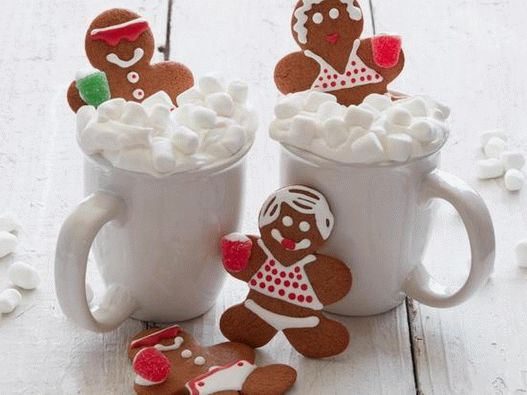 Photo of Gingerbread men in a hot chocolate whirlpool