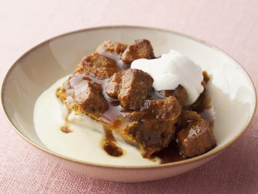 Photo of pumpkin bread pudding with spicy caramel apple sauce and vanilla custard