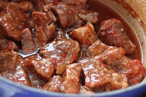 Photo Ribs in a rustic style with moyo sauce