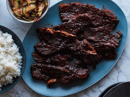 Photo Ribs in a slow cooker and Korean spicy cucumbers