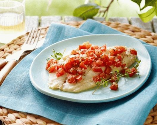 Photo - Tilapia with vegetables in a foil in the oven