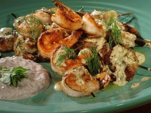 Photo - Grilled prawns on skewers with mustard and dill dressing and yogurt sauce with olives