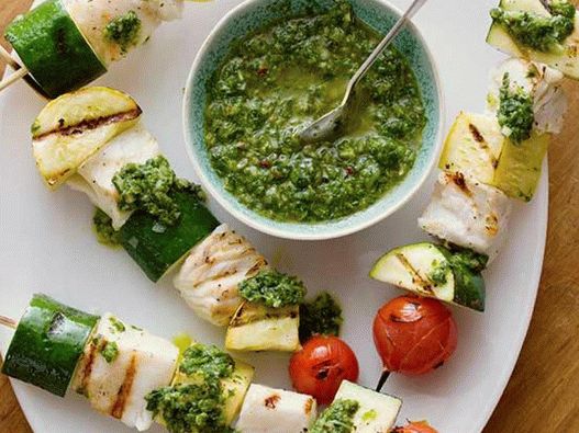 Fish skewers with chimichurri sauce with basil