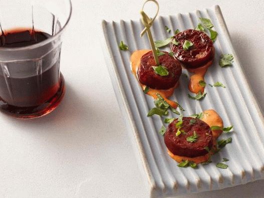 Chorizo   fried sausage canapes with smoked paprika