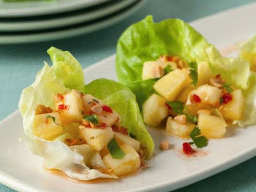 Photo - Appetizer with pineapple on lettuce and Thai sauce