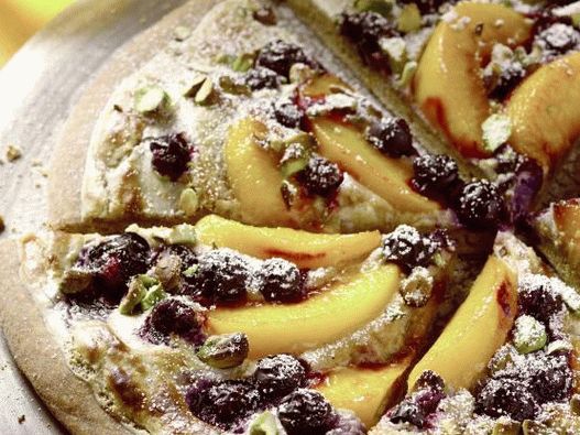 Pizza with peaches and blueberries