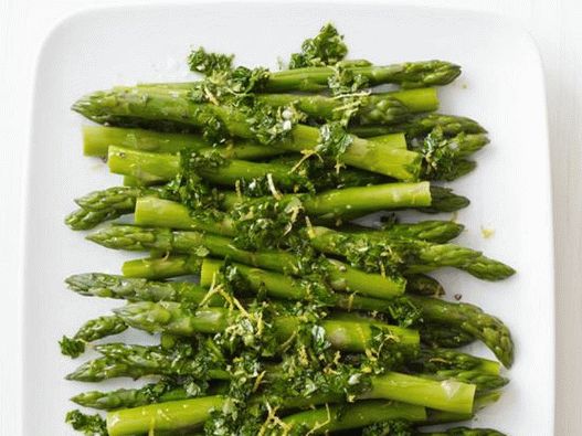 Photo of the dish - Asparagus with parsley on a side dish