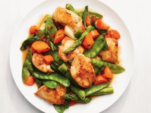 Chicken fried with spring vegetables in apricot glaze