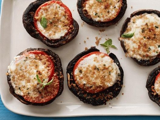 Stuffed mushroom caps baked under the grill