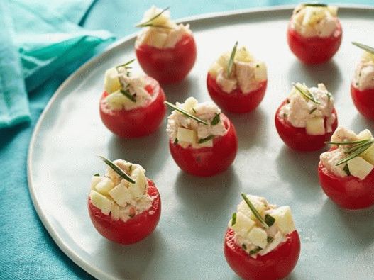 Cherry tomatoes stuffed with chicken salad with apples