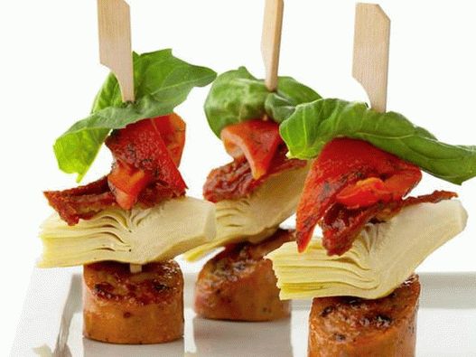 Antipasto with sausage on skewers