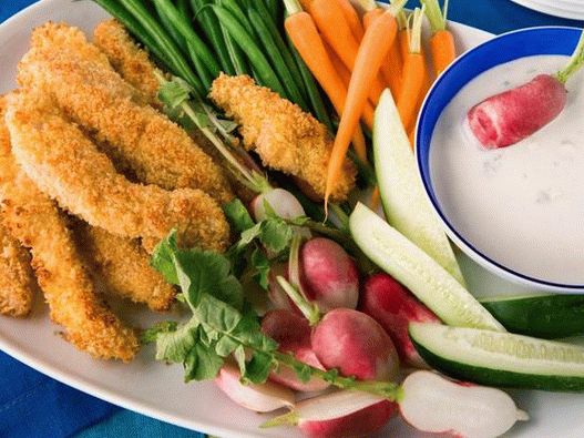 Breaded chicken fingers and crudit with blue cheese dip sauce