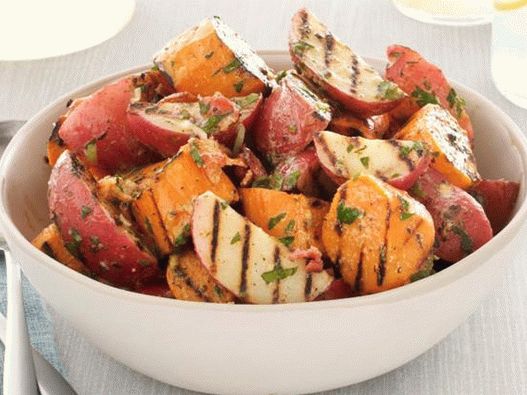 Potato grilled salad with bacon and green onions