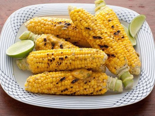 Corn on the cob with jalapeno peppers and lime