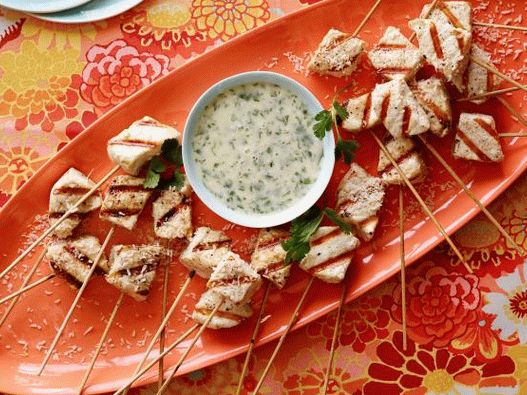Photo of grilled swordfish with spicy coconut sauce