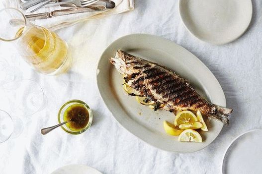 Photo of a whole grilled fish in the Greek style