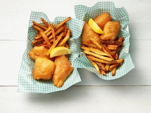 Photo Fish in beer batter with french fries