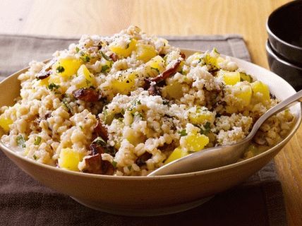 Photo of pearl barley risotto with mushrooms and pumpkin