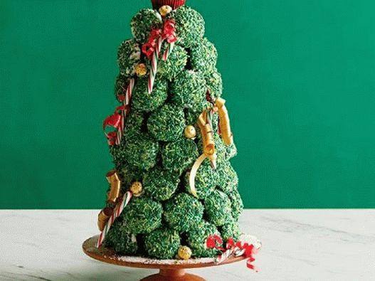 Photo of Christmas tree made of cupcakes