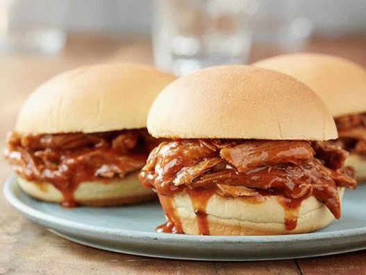 Photo Ragged pork in a slow-cooker barbecue sauce