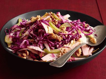Photo Salad of red cabbage, endive and celery with walnuts