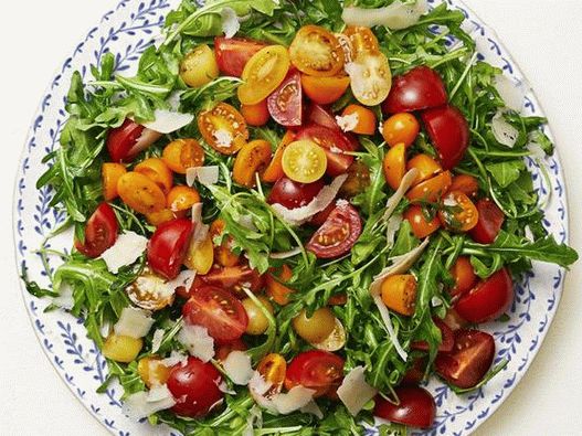 Photo Arugula salad with tomatoes