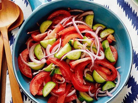Photo Salad of tomatoes, onions and cucumbers