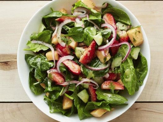 Photo Salad with strawberries, cucumbers and melon