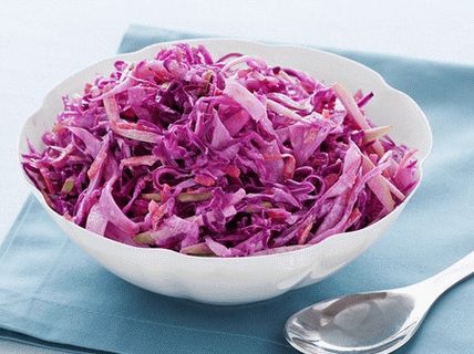 Photo Salad with red cabbage, carrots and apples