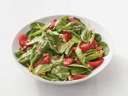 Photo Salad with spinach and fried grapefruit