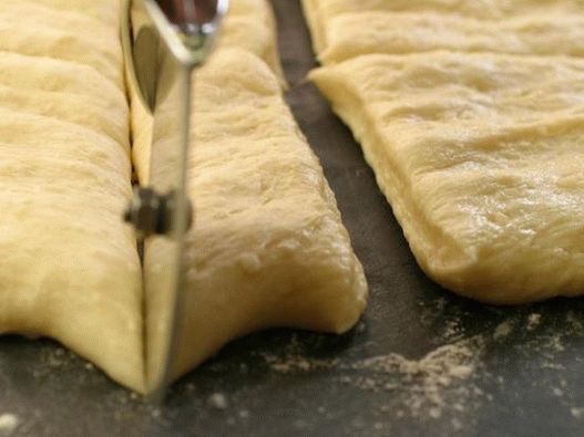 Cut a layer of dough