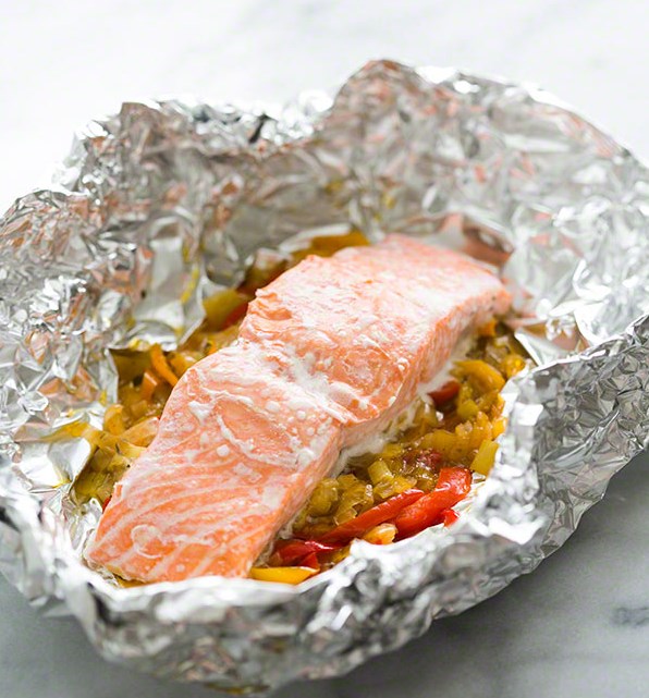Salmon with vegetables in foil