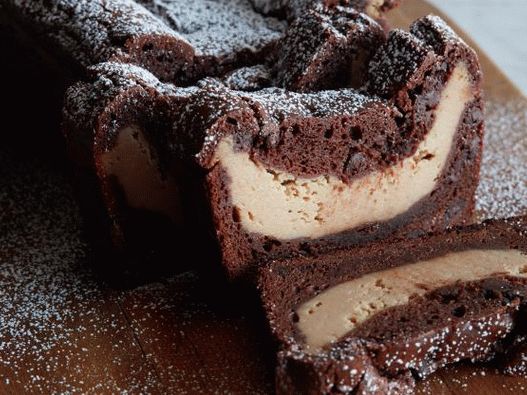 Photo Chocolate roll with curd and peanut butter paste