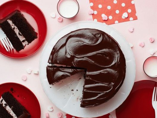 Photo Chocolate cake with curd cream and cherries