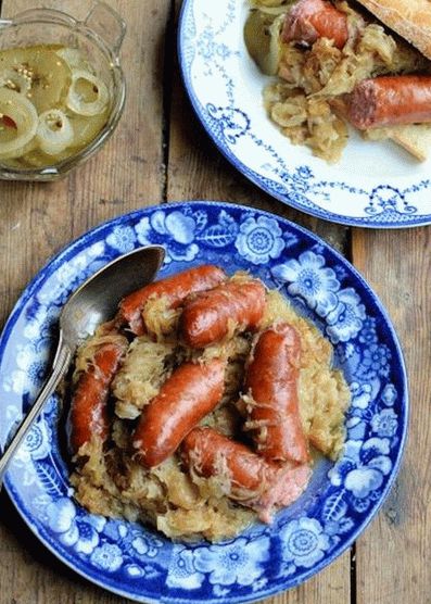 Photo of Shukrut (sauerkraut stewed in beer with sausages)