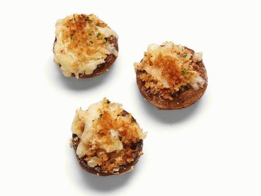 Photo Cheese fondue in mushroom caps