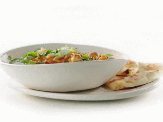 Photo Curry sauce with peppers, chicken, lamb or beef